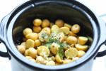 Slow Cooker Garlic Parmesan Potatoes Your family and Friends will Love. These garlic Parmesan potatoes is a super simple side dish that anyone can make in a Crock Pot. Look at those crisp tender potatoes loaded with garlicky Parmesan, Yummy! As seen on SlowCookerSociety.com
