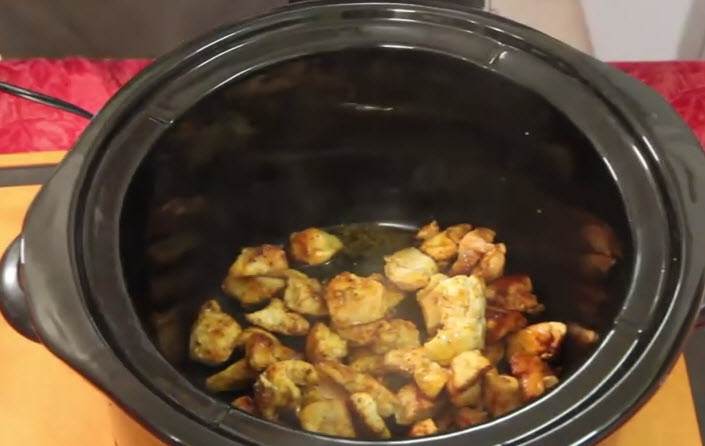 Busy People's Slow Cooker Chicken Paella throw chicken in crock-pot