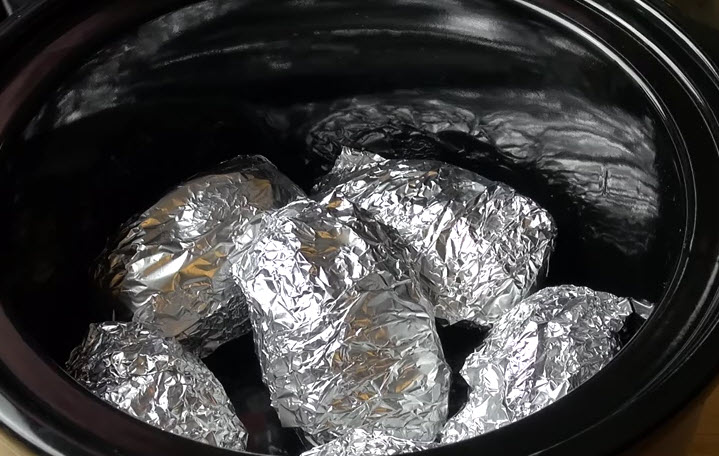 Crock-Pot Baked Potatoes wrap them in aluminium foil