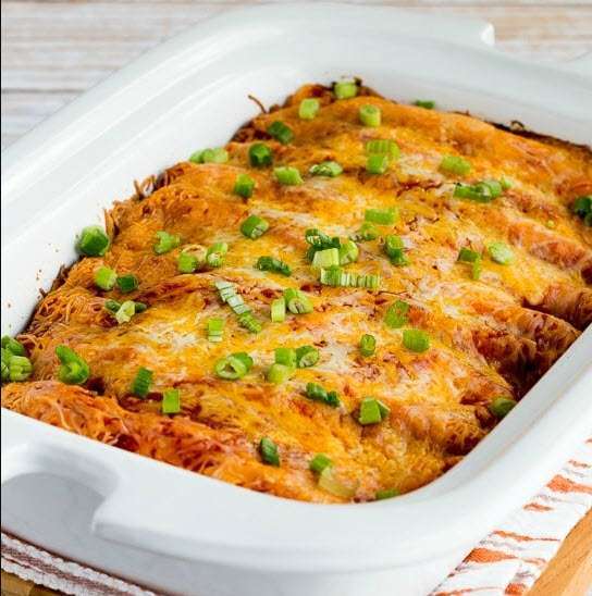 Sour Cream Slow Cooker Chicken Enchiladas Yummy as seen on SlowCookerSociety
