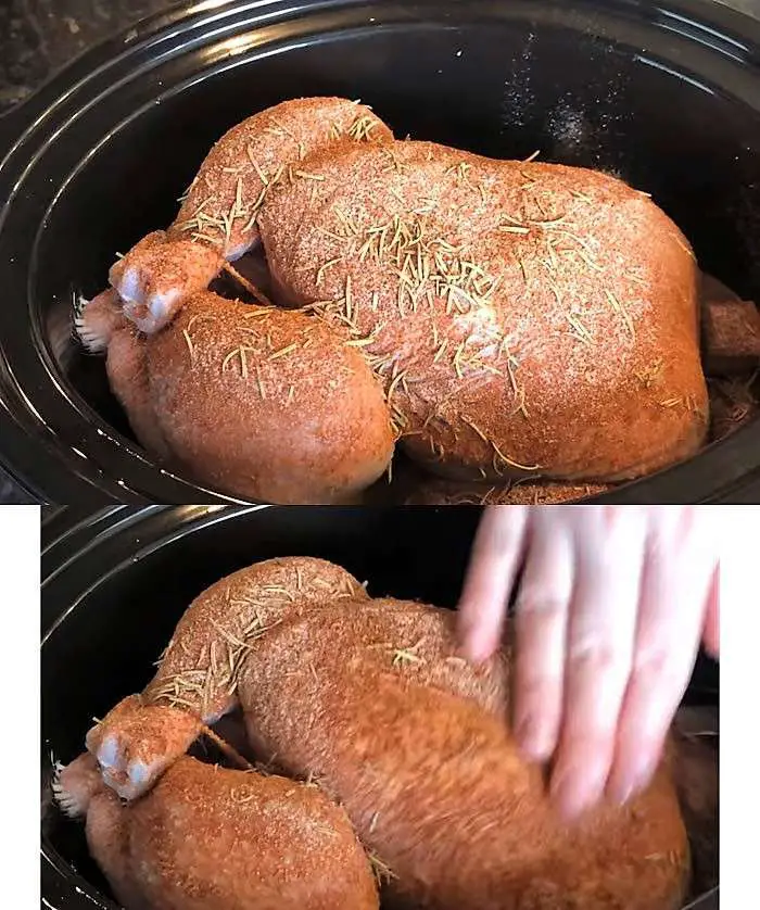 Slow Cooker Whole Roast chicken add the rub and rub gently as seen on SlowCookerSociety