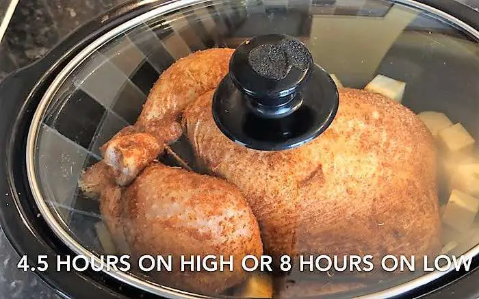 Slow Cooker Whole Roast chicken cover and cook on high or low as seen on SlowCookerSociety