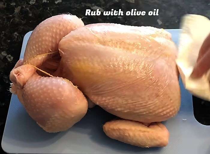 Slow Cooker Whole Roast chicken rub with olive oil as seen on SlowCookerSociety