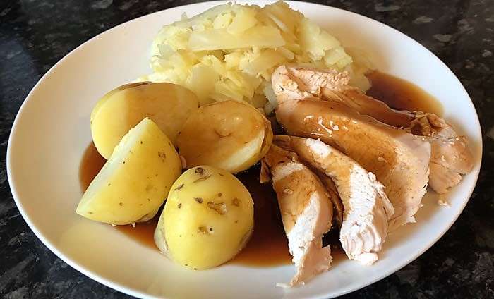 Slow Cooker Whole Roast chicken serve it Yummy as seen on SlowCookerSociety